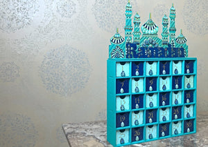 Countdown activity calendar for Ramadan. In mint green, teal and dark blue colours with gold numbers